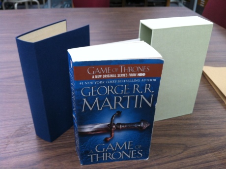 A Game of Thrones with its chemise and slipcase